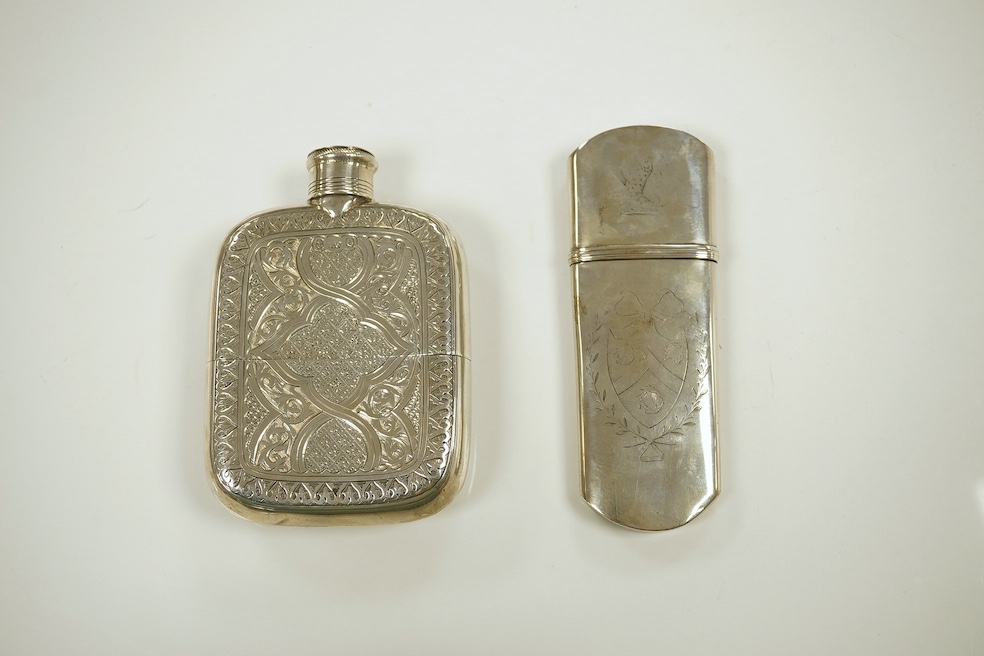 A Victorian silver pocket flask with cup base, maker George Unite, Birmingham 1865, gross 5 oz, and an unmarked Victorian white metal spectacles case. Condition - good